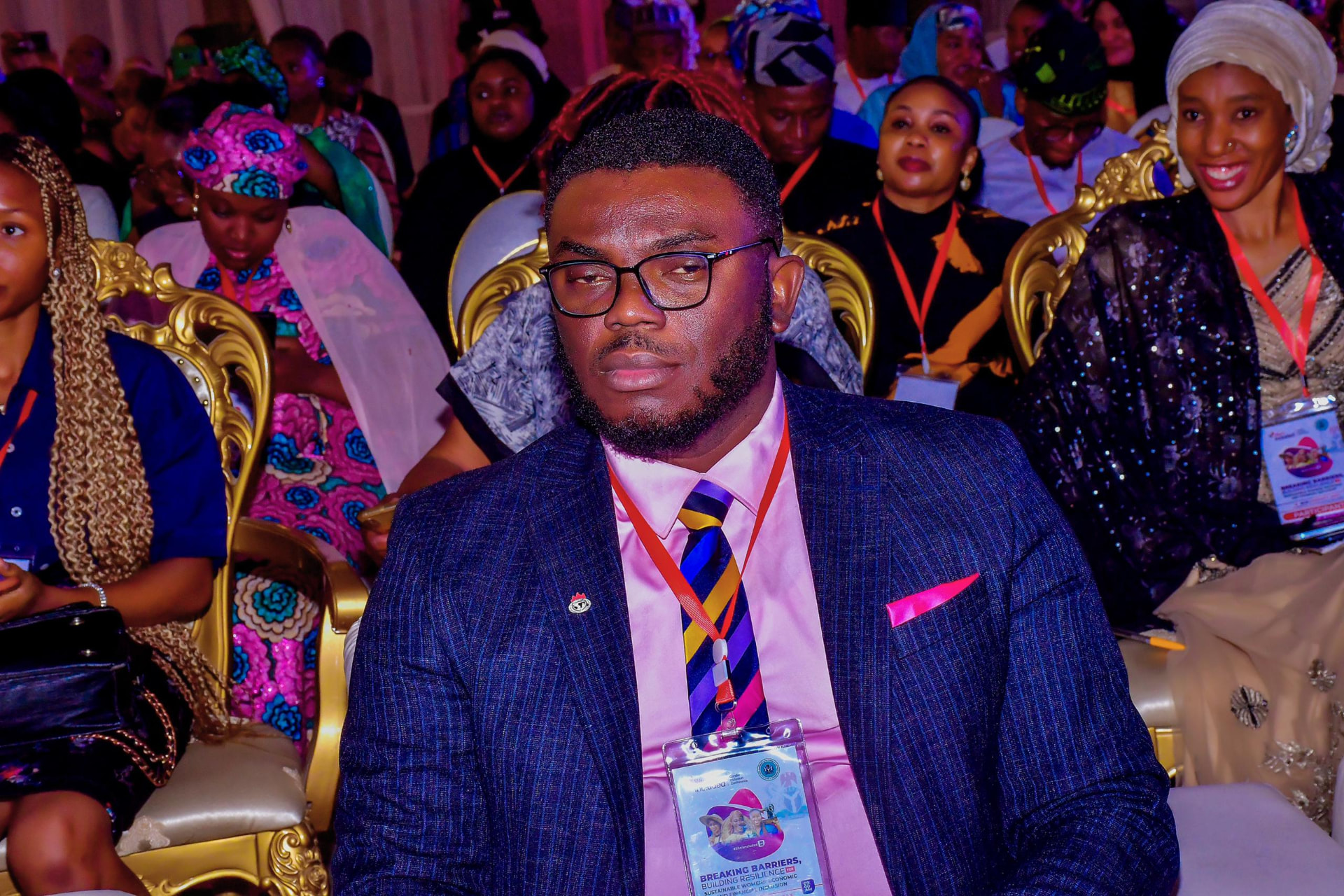 Yeshua Russel at a conference on women's economic and financial inclusion